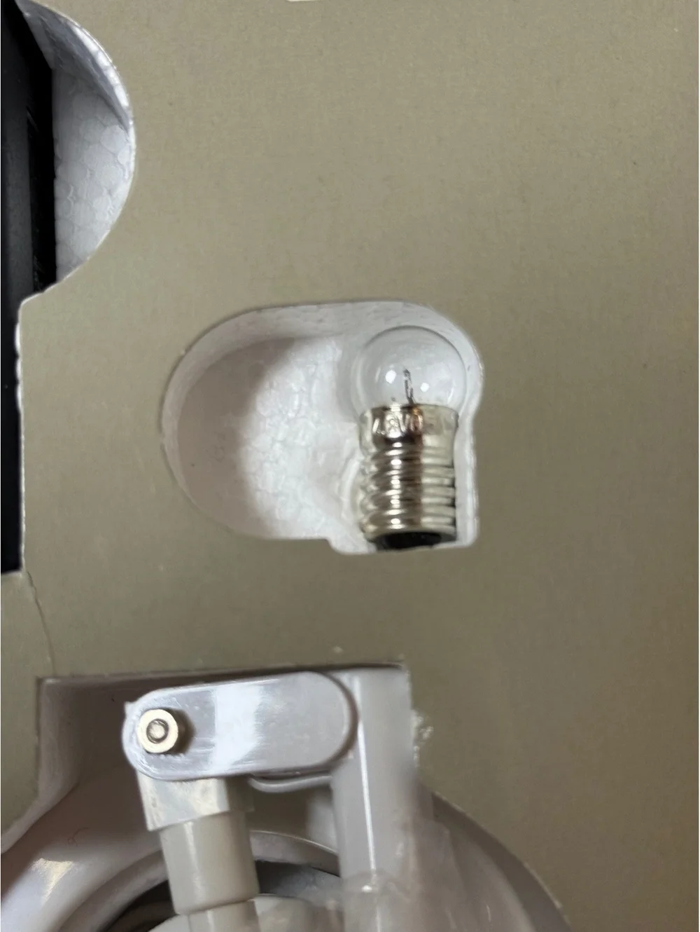 The itty bitty book light by Zalco - Vintage Reading Light 1982